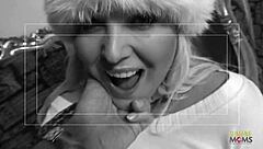 i see curvy blonde girl interacting with multiple guys in a group setting