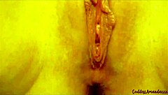 Chubby girl plays with shaved clit during pissing orgasms