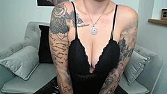 fetish leather camgirl nina undresses seductively