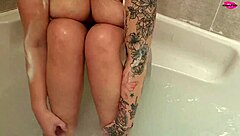 milf seductively washing her feet while getting wet