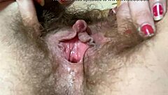 Watch bushy pussy clit grow in closeup wet orgasm.