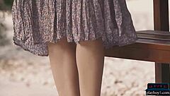 Russian milf model poses naked outdoors in nature