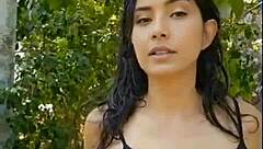 Beautiful Skinny Latina Brunette Presents in Forest with Wet Black Outfit
