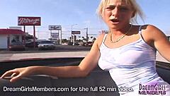 Blonde flashes in car backseat