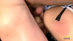 tattooed brunette hangs out with multiple guys on sofa