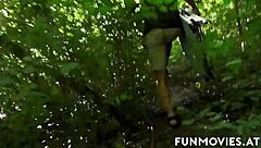 this amateur brunette milf is fucking hard in the woods