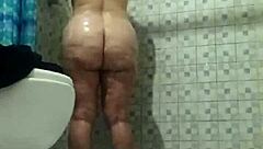 Hidden camera in shower. Spying on mature stepmother.