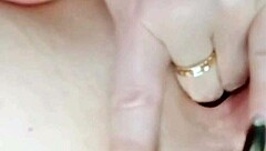 Big ass milf fingers her wet pussy close up.