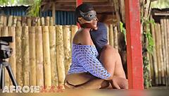 man touches naked girl outdoor