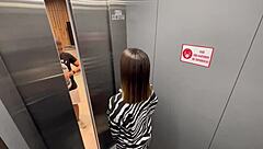 Horny neighbor bangs me in public elevator quickie. Almost caught in slutty building action!