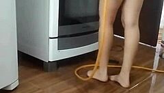 Detailed Footage Of My Naked Employee Washing The Stove, Revealing Her Amateur Fetish Side.