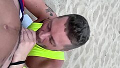 Intense public blowjob on gay beach outdoors