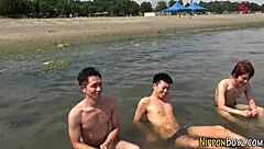 Gay Asian Twinks Sucking in Steamy Threesome Action