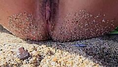 natural girl enjoys nudism on public beach
