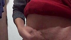 i'm jerking off with my clothes on, feeling the skinny cock in my hand as i masturbate alone.