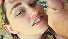 Closeup of dirty talking blonde hotwife giving blowjob and receiving facial