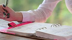 Rebecca Volpetti inspects plumber's big stiff pipe.