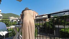 Naked Woman Flashes Pussy on Balcony Over Road