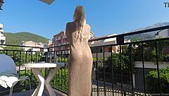 Naked Woman Flashes Pussy on Balcony Over Road