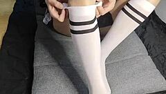 Look at this slim gay teen's beautiful feet in foot fetish video