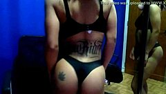 Anjinha poses sensually in front of the mirror while touching herself