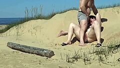 Assisting a juicy mature woman on the beach