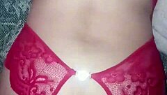 red lingerie soaked in cum from a wild group session with swingers