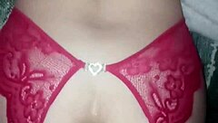 red lingerie soaked in cum from a wild group session with swingers