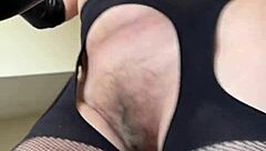 hairy milf does a fetish workout in fishnets at the gym