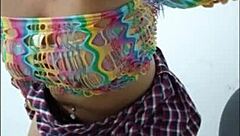 Beautiful woman inserts pink dildo into wet pussy in softcore solo scene.