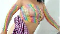 Beautiful woman inserts pink dildo into wet pussy in softcore solo scene.