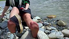 Goddess In Tan Nylons Shows Cute Nylon Soles And Toes On The Riverside