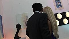 Classy blonde milf in heels and fishnets gets titty fucked.