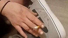 my friend is having fun stepping on and trashing my sneakers with her feet