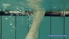 Katya feels free in red dress at pool.