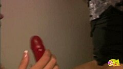 Her lesbian lover stuffs her tight cunt with a long dildo to make her cum