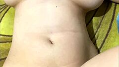 Is This Petite Pregnant Babe Teasing Her Fan on Cam with Close-Up Pussy Shots?