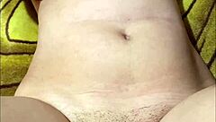 Is This Petite Pregnant Babe Teasing Her Fan on Cam with Close-Up Pussy Shots?