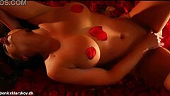 denise klarskov plays her lovely wet pussy in a sea of red roses danish scandinavian orgasm