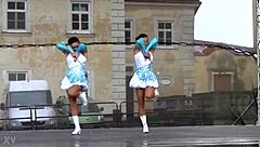 yo, check these two cute majorettes showing off their moves!
