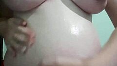 pregnant woman enjoys cream and massage session