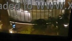 public masturbation tease at hotel window