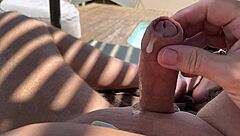 Mature amateur flashes big cock outdoors, leading to orgasm and cumshot in desert