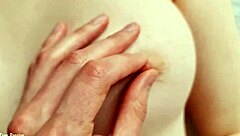 Gorgeous couple enjoys intimate moment.