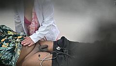 lady doctor chats playfully with patient in hospital setting