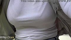Wifey goes for a public dare bike ride braless with her amazing tits in a tight white shirt. I can't believe she flashed those big boobs!