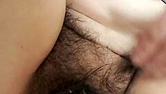 Mature milf reveals her thick hairy beaver while urinating at home