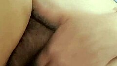 Mature milf reveals her thick hairy beaver while urinating at home