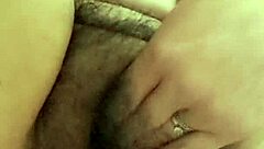 Mature milf reveals her thick hairy beaver while urinating at home