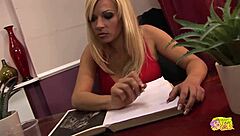 The brunette secretary catches her blonde boss masturbating in the office and helps with licking and fingering her wet pussy